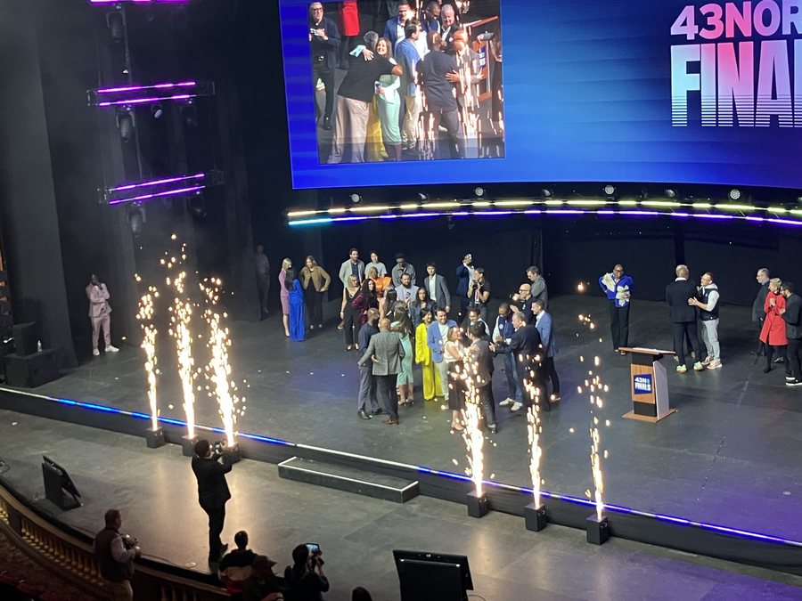 A row of cold spark fountains firing across a stage