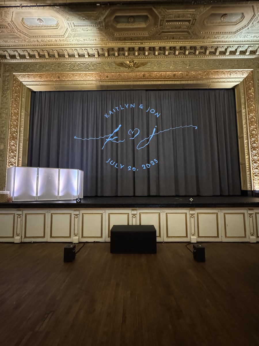 Custom monogram projected at a wedding